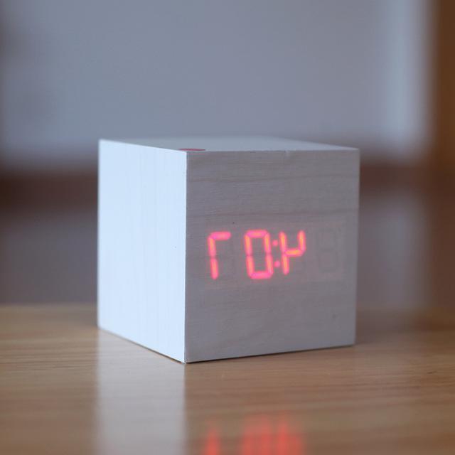 Digital Wood Clock with Luminous Display and Minimalist Design